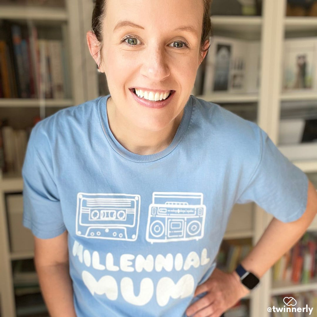 Woman smiling taking selfie wearing twin mum tshirt